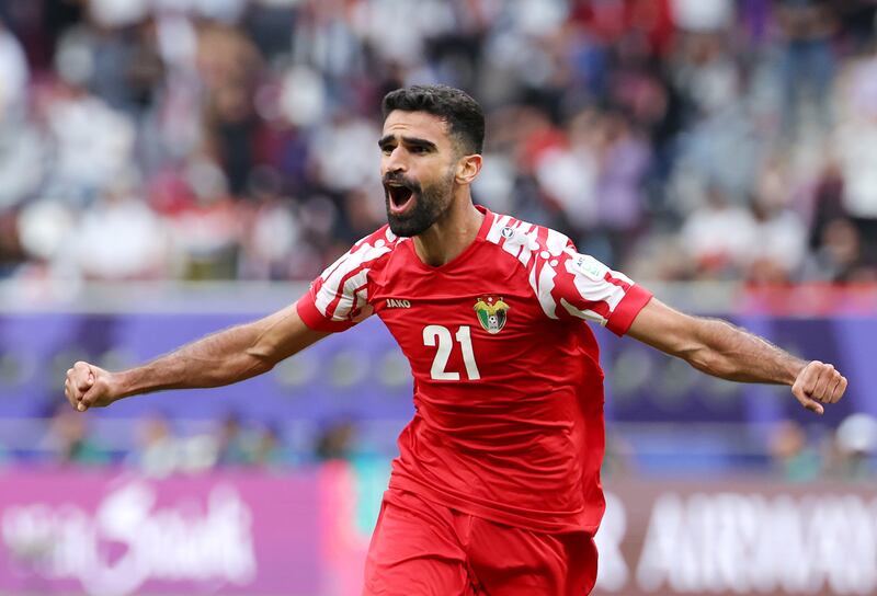 Nizar Al Rashdan of Jordan celebrates scoring his team's late winner in the 3-2 Asian Cup last-16 victory over Iraq at Khalifa International Stadium in Doha on Monday, January 29, 2024. Getty Images
