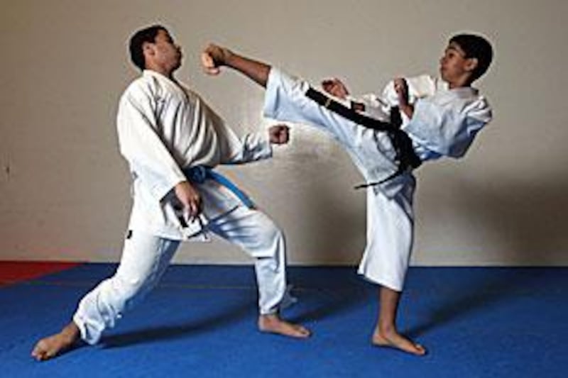 Khalifa al Abbar, right, is ranked the fourth best karate practitioner of his age in Europe.