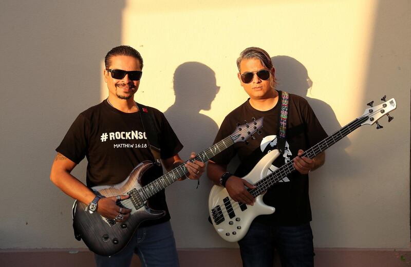 DUBAI , UNITED ARAB EMIRATES , February 14 – 2019 :- Left to Right – Rajesh Pereira and Neil Thompson from Rock and Soul band at the St Francis of Assisi Catholic Church in Jebel Ali in Dubai.  ( Pawan Singh / The National ) For News. Story by Patrick