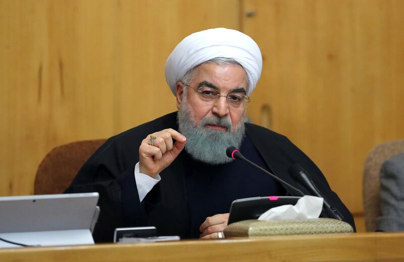 In this photo released by official website of the office of the Iranian Presidency, President Hassan Rouhani speaks in a cabinet meeting in Tehran, Iran, Sunday, Dec. 31, 2017. After a wave of economic protests swept major cities in Iran, President Rouhnai said Sunday that people have the right to protest, but those demonstrations should not make the public "feel concerned about their lives and security." (Iranian Presidency Office via AP)