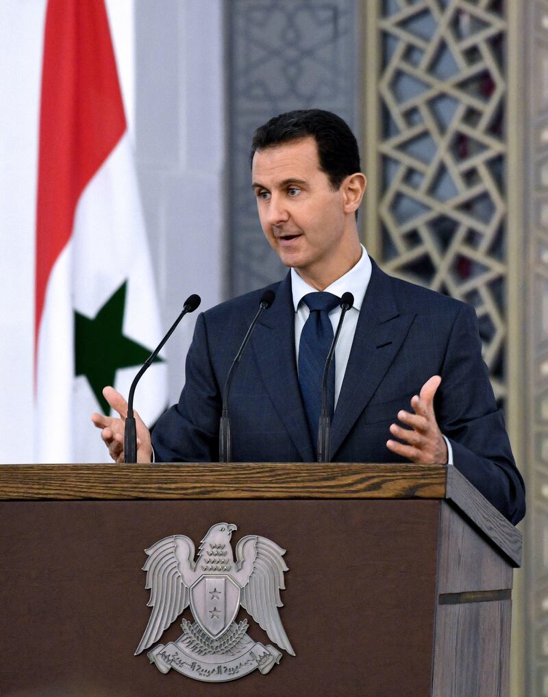 epa06153123 A handout photo made available by Syrian Arab News Agency (SANA) shows Syrian President Bashar Assad speaking at the opening of the Foreign and Expatriates Minister Conference in Damascus, Syria, 20 August 2017.  EPA/SANA HANDOUT  HANDOUT EDITORIAL USE ONLY/NO SALES