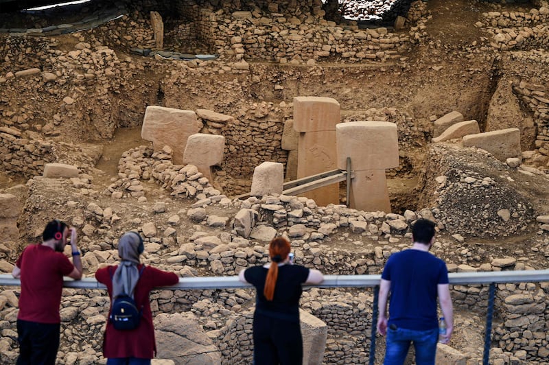 Visitors gaze at ancient pillars at the archaeological site of Gobekli Tepe in Sanliurfa, Turkey. All photos: AFP