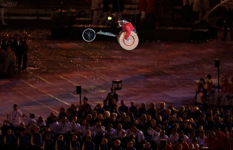 A performers races suspended in mid-air during the Opening Ceremony for the 2012 Paralympics in London, Wednesday Aug. 29, 2012.(AP Photo/Lefteris Pitarakis) *** Local Caption ***  London Paralympics Opening Ceremony.JPEG-0cd71.jpg