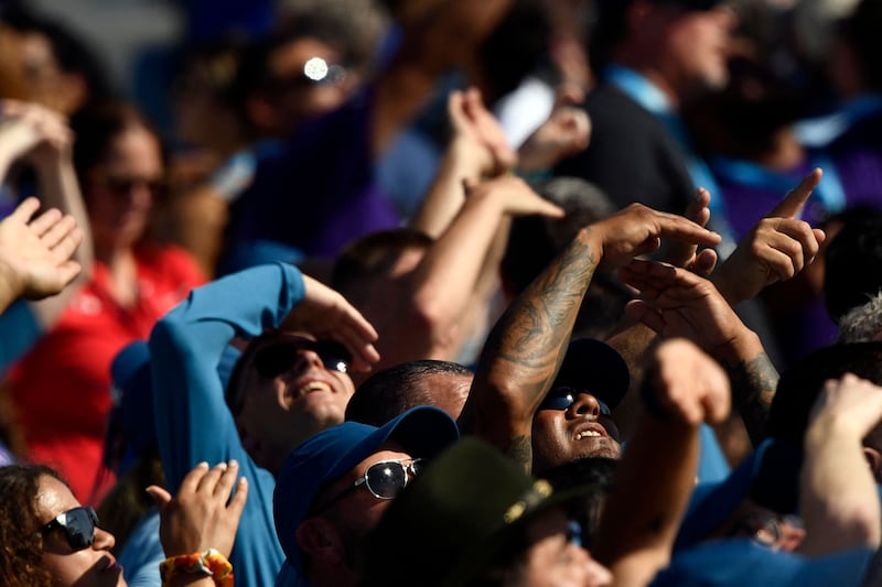 Spectators watch as the 'VSS Unity' separates from its mothership.