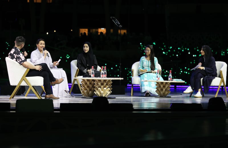 Ms Al Mheiri with Minister of Community Development and and Cop28 Youth Climate Champion Shamma Al Mazrui,  Youngo spokeswoman and lead on nationally determined contributions working group Shreya KC and UN climate change high-level champion Razan Al Mubarak, in discussion on stage