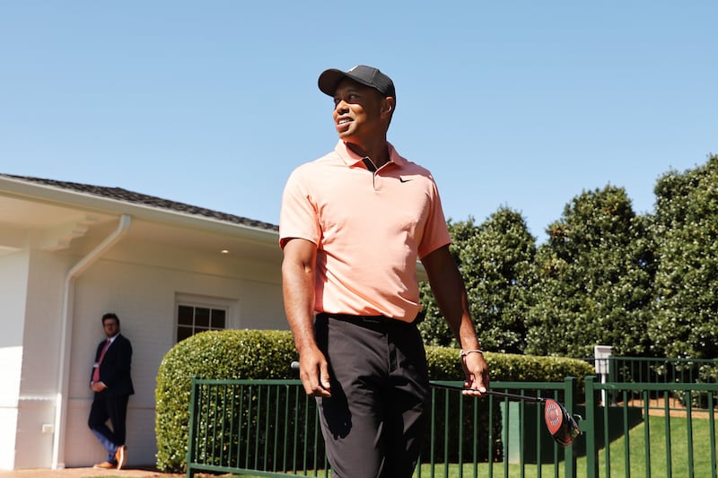 Tiger Woods walks from the practice area at Augusta National Golf Club. AFP