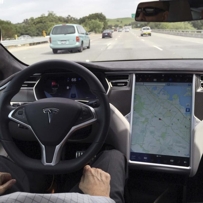 The interior of a Tesla Model S in autopilot mode. Alexandria Sage / Reuters