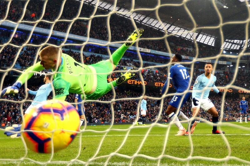 Gabriel Jesus of Manchester City scores his team's second goal past Jordan Pickford of Everton. Getty Images