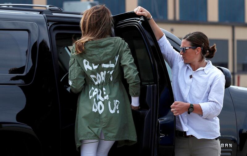 US first lady Melania Trump climbs into her motorcade vehicle wearing a Zara design jacket with the phrase "I Really Don't Care. Do U?" on the back as she returns to Washington from a visit to the US-Mexico border area in Texas, at Joint Base Andrews, Maryland, on June 21, 2018. Reuters
