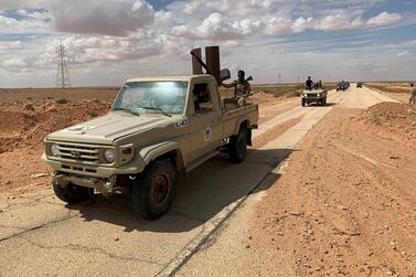 Troops loyal to Libya's eastern government patrol the area in Zamzam, near Abu Qareen, Libya. Reuters  