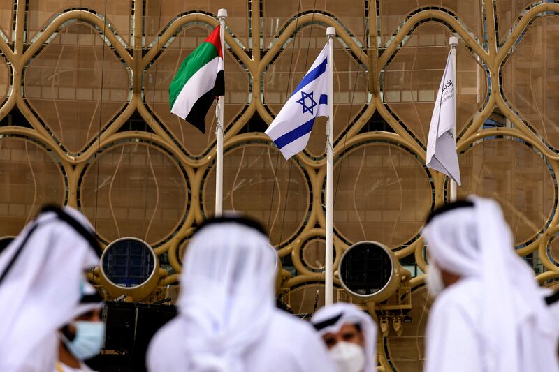 The UAE and Israeli flags at Expo 2020 Dubai. The two countries started negotiations for a trade pact in November last year. AFP