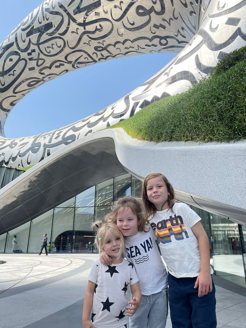 From left, Caspian, 3, Fox, 6, and Indiana, 9 outside the Museum of the Future. One of the levels is dedicated to encouraging goal-sharing and innovation among children.