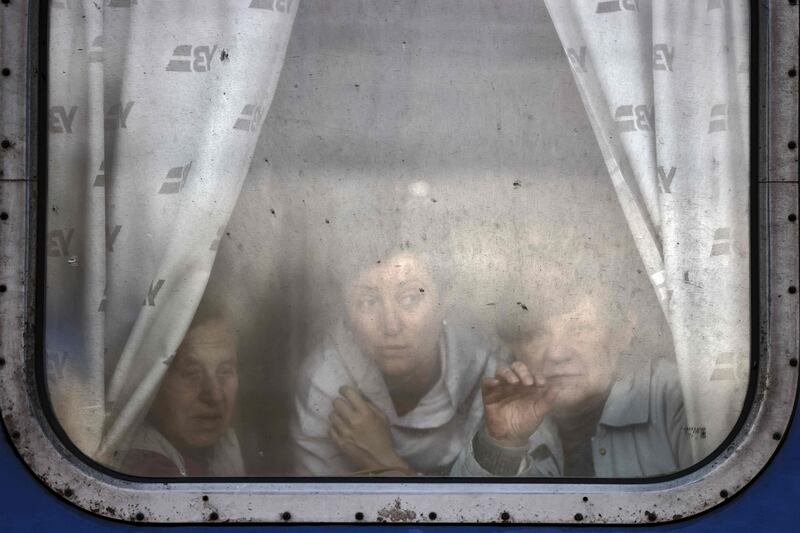 Women bid farewell to relatives as they leave the Slovyansk central station in the Donbas region. AFP