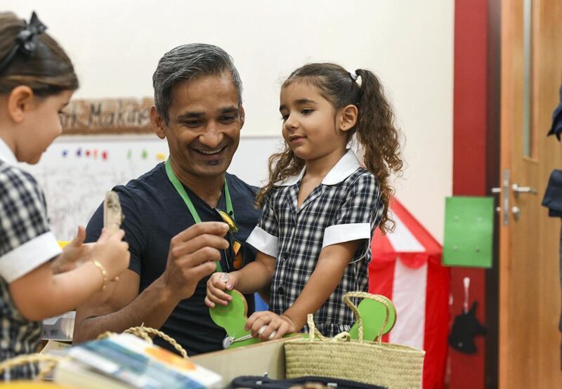 Abu Dhabi, United Arab Emirates -  Tariq Riaz, father of Emma, 3, at her first day to school at Brighton College, in Abu Dhabi. Khushnum Bhandari for The National