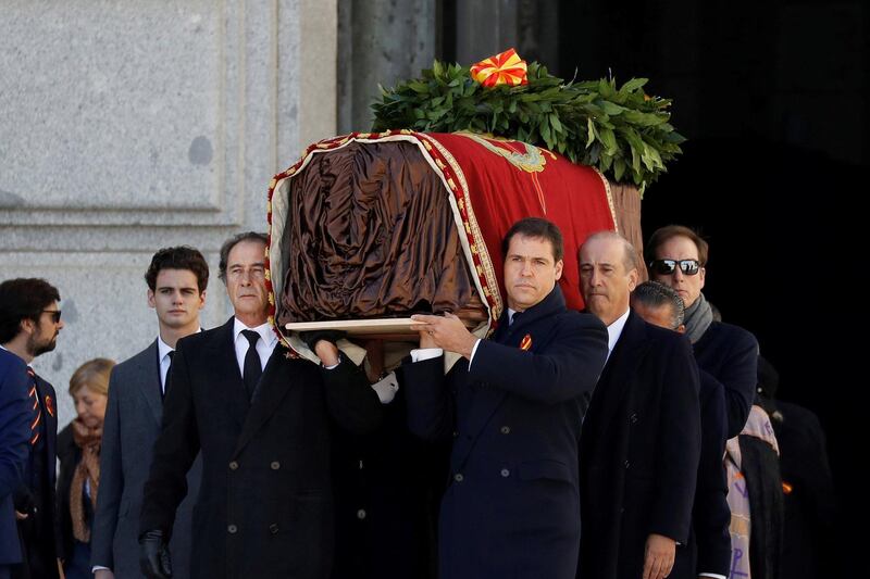 Relatives of late Spanish dictator Francisco Franco, carry the coffin after the exhumation at The Valle de los Caidos (The Valley of the Fallen) in San Lorenzo de El Escorial, Spain, October 24, 2019. Juan Carlos Hidalgo/Pool via REUTERS
