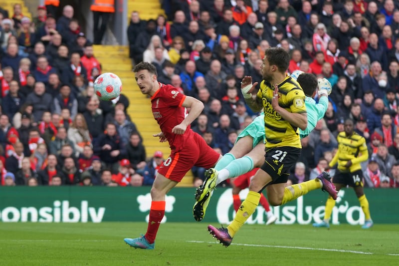 Diogo Jota heads Liverpool into the lead against Watford in the Premier League match at Anfield on Saturday, April 2, 2022. AP