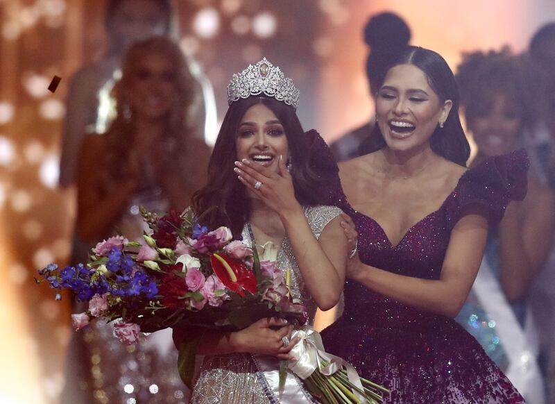 Miss India Harnaaz Sandhu, left, is crowned Miss Universe 2021 by Miss Universe 2020 Andrea Meza from Mexico during the Miss Universe 2021 pageant in Eilat, Israel.  Contestants from 80 countries and territories competed in the Miss Universe 2021 pageant. EPA