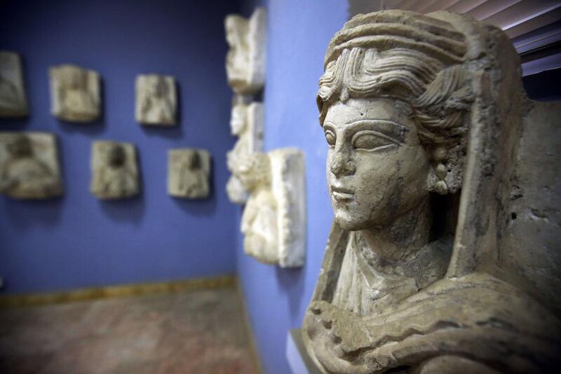 Palmyra, which means City of Palms, is known in Syria as Tadmor, or City of Dates. File photo from March 14, 2014, shows a sculpture in the ancient Syrian oasis city of Palmyra, 215 kilometres north-east of Damascus, displayed at the city’s museum. Joseph Eid / AFP Photo