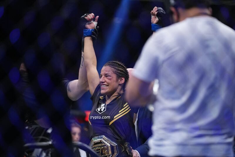 Julianna Pena is declared the winner by submission against Amanda Nunes. Reuters