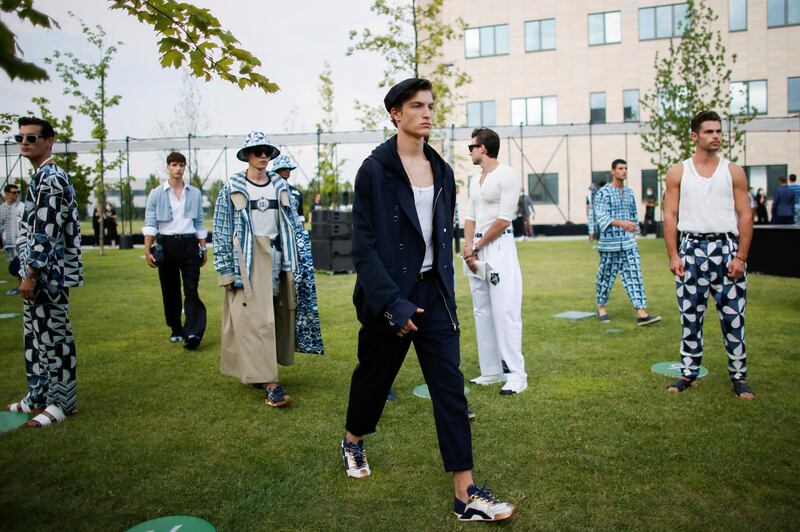 Models present looks from the from the Dolce & Gabbana Spring / Summer 2021 men's collection in a live-streamed show during Milan Digital Fashion Week. Reuters