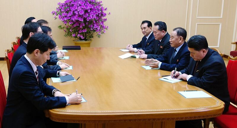 In this photo provided by South Korea Presidential Blue House via Yonhap News Agency, Kim Yong Chol, vice chairman of North Korea's ruling Workers' Party Central Committee, second from right, talks with South Korean delegation in Pyongyang, North Korea, Monday, March 5, 2018.  Envoys for South Korean President Moon Jae-in, led by Moon's national security director, Chung Eui-yong, are on a rare two-day visit to Pyongyang thatâ€™s expected to focus on how to ease a standoff over North Koreaâ€™s nuclear ambitions and restart talks between Pyongyang and Washington. (South Korea Presidential Blue House/Yonhap via AP)