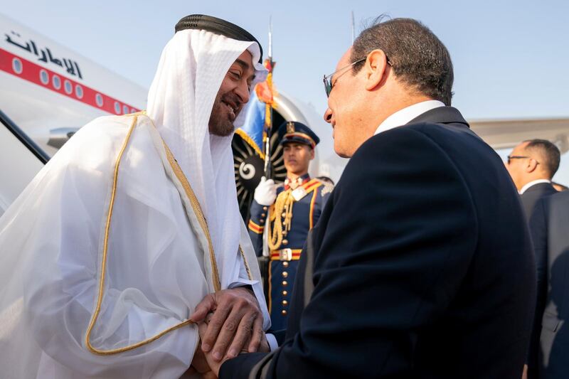 CAIRO, EGYPT - May 15, 2019: HH Sheikh Mohamed bin Zayed Al Nahyan Crown Prince of Abu Dhabi Deputy Supreme Commander of the UAE Armed Forces (L), is received by HE Abdel Fattah El Sisi, President of Egypt (R), upon arrival at Cairo international Airport. 

( Mohamed Al Hammadi / Ministry of Presidential Affairs )
---