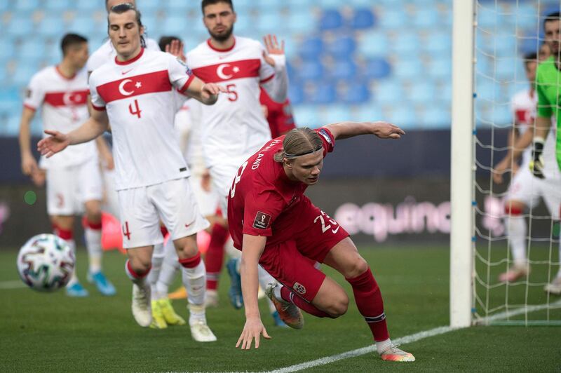 Norway's Erling Braut Haaland attempts to retrieve the ball against Turkey. AFP