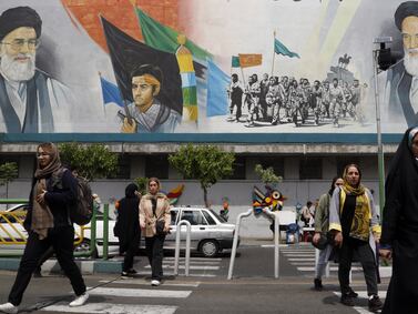 A mural of Iranian supreme leader Ayatollah Ali Khamenei, left, and late supreme leader Ayatollah Ruhollah Khomeini, right, in Tehran. EPA