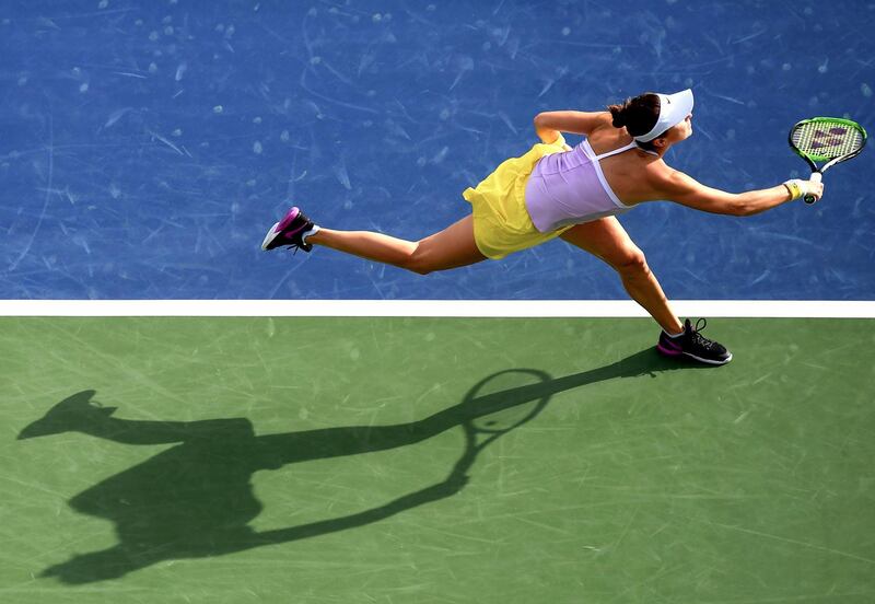 Switzerland's Belinda Bencic returns the ball. AFP