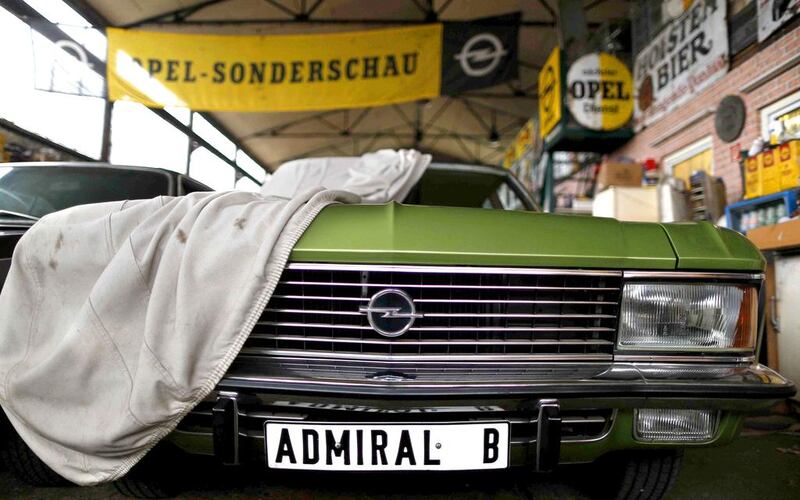 A vintage Opel ‘Admiral’ car is covered at the Opel museum in Herne. Ina Fassbender / Reuters