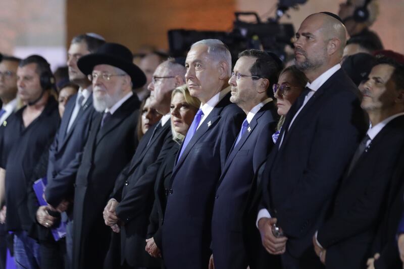 Israeli Prime Minister Benjamin Netanyahu, centre, with his wife and officials at the opening of Holocaust Martyrs' and Heroes' Remembrance Day. EPA