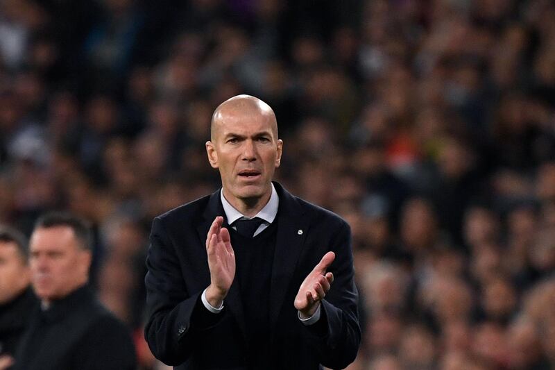 Real Madrid's French coach Zinedine Zidane applauds at the final whistle. AFP