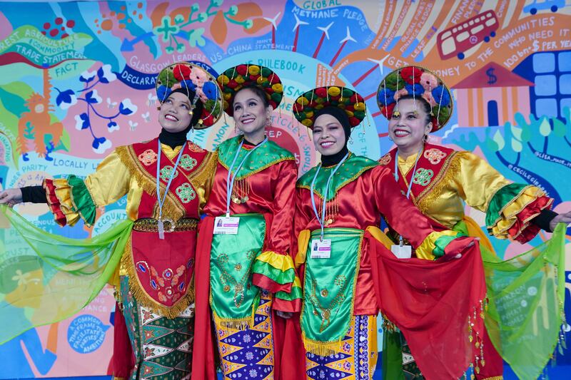 Indonesian delegates pose for a picture inside the Blue Zone. PA