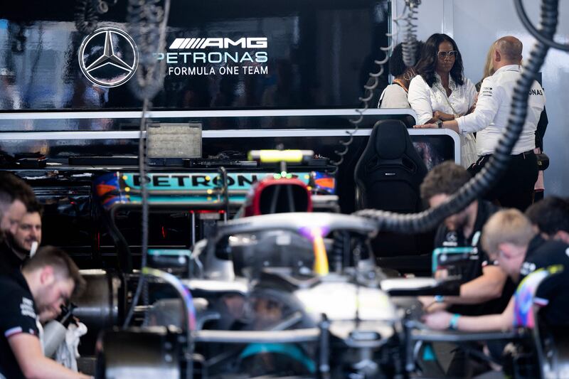 Former US First Lady Michelle Obama at the Mercedes garage. AFP