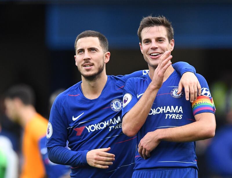 epa07203624 Chelsea's Cesar Azpilicueta (R) and Eden Hazard greet supporters after winning the English Premier League soccer match between Chelsea and Fulham at Stamford Bridge in London, Britain, 02 December 2018.  EPA/FACUNDO ARRIZABALAGA EDITORIAL USE ONLY. No use with unauthorized audio, video, data, fixture lists, club/league logos or 'live' services. Online in-match use limited to 75 images, no video emulation. No use in betting, games or single club/league/player publications