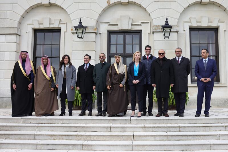 UK Foreign Secretary Liz Truss, centre, poses for a photograph with members of the Gulf Co-operation Council (GCC) at Chevening House. Photo: Downing St handout