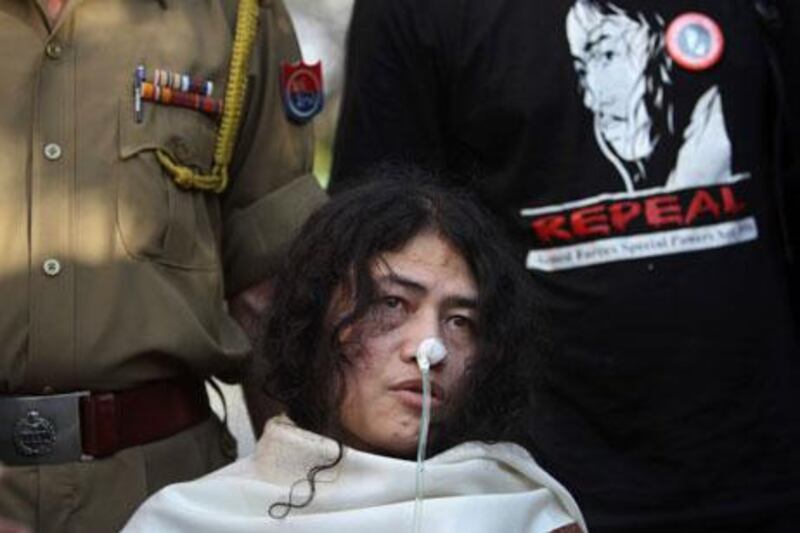 Irom Sharmila holds a press conference in New Delhi on Monday after she was charged with attempted suicide. Tsering Topgyal / AP Photo
