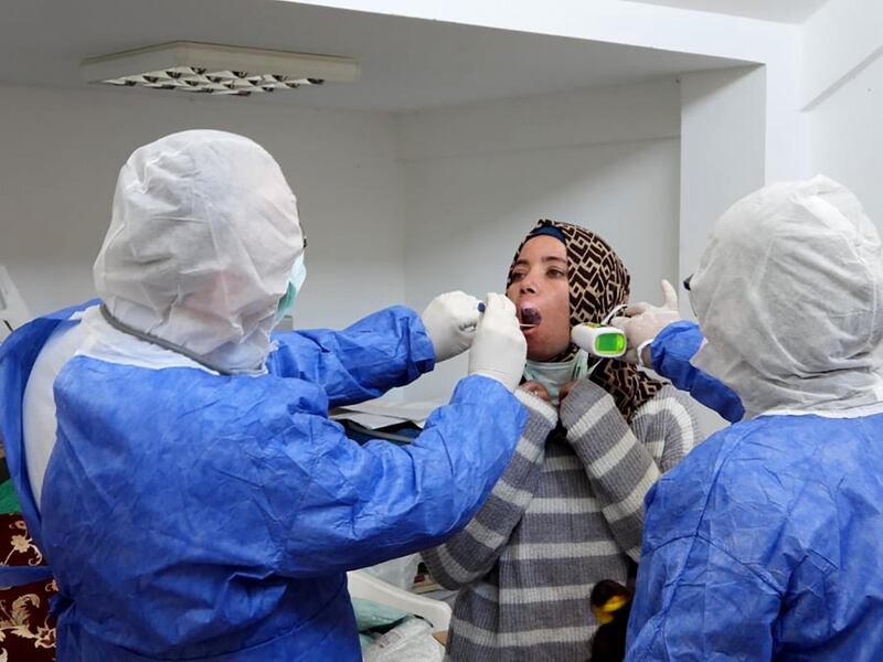 Medics perform an examination on a rescued Syrian refugee in the Iskele district (Trikomo) in the self-declared Turkish Republic of North Cyprus (TRNC) recognised only by Turkey, north of Famagusta.  AFP