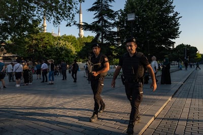 Turkish riot police officers patrol near the Blue Mosque in Istanbul.  AFP
