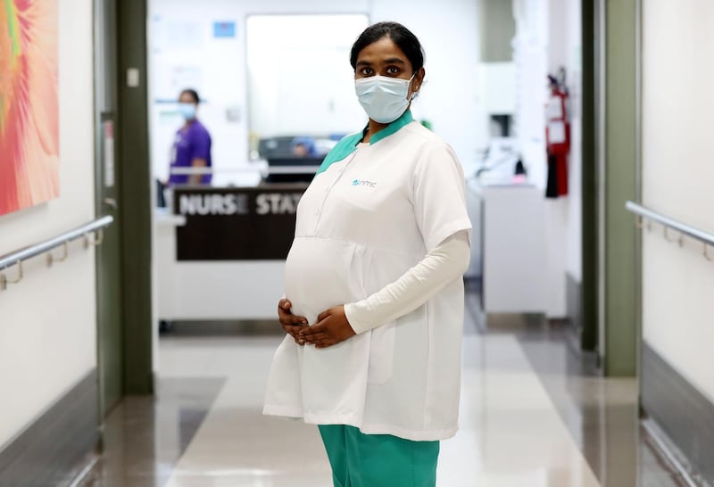 Dubai, United Arab Emirates - Reporter: N/A. News. Health. Photo Project. Nurse Ruth Deva Kiruba (who is pregnant) at the NMC Royal Hospital, DIP. Photo project on hospital staff that Covid-19, recovered and carried on treating patiences. Monday, July 27th, 2020. Dubai. Chris Whiteoak / The National