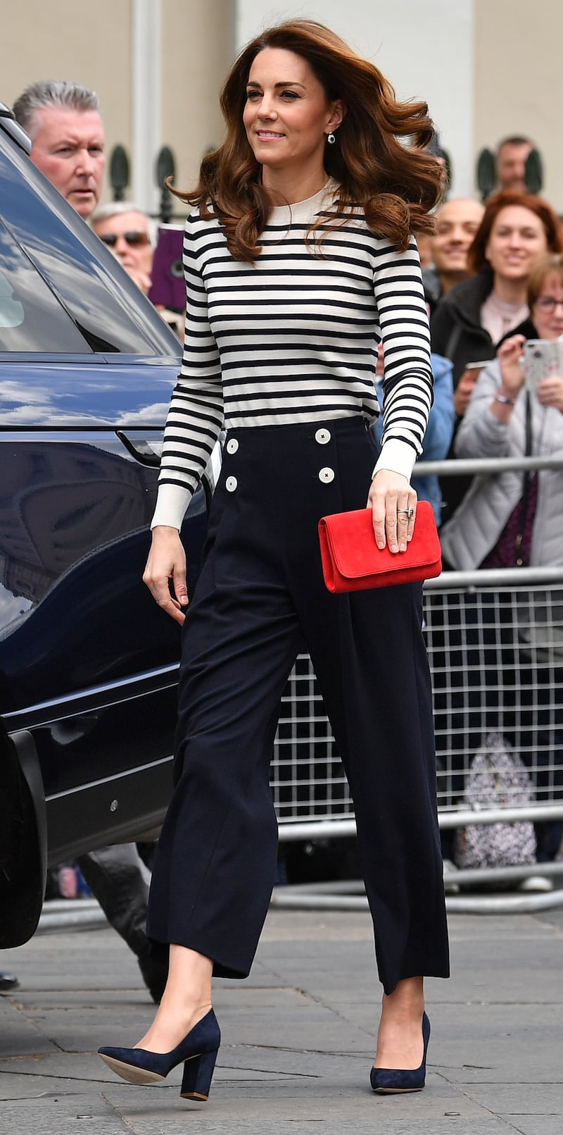 Catherine, Duchess of Cambridge, in nautical stripes and LK Bennett trousers, attends the King's Cup Regatta at Greenwich on May 7, 2019 in London, England. Getty Images