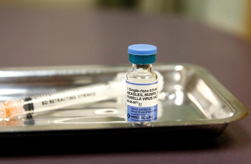 FILE PHOTO: A vial of the measles, mumps, and rubella (MMR) vaccine is pictured at the International Community Health Services clinic in Seattle, Washington, U.S., March 20, 2019. Picture taken March 20, 2019.  REUTERS/Lindsey Wasson/File Photo