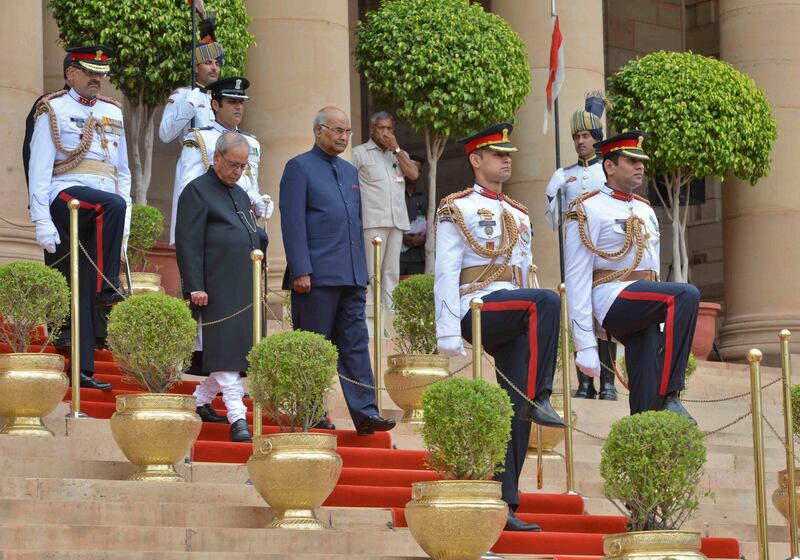India's President elect Ram Nath Kovind, center right, accompanied by outgoing president Pranab Mukherjee, center left,leaves the Presidential Palace to the Parliament for the swearing in ceremony in New Delhi, India, Tuesday, July 25, 2017. Kovind, a Hindu nationalist leader backed by Prime Minister Narendra Modi was elected last week as India's 14th president, a largely ceremonial position. (India Presidentâ€™s office via AP)