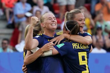Stina Blackstenius celebrates with teammates after scoring the winning goal for Sweden against Germany. EPA