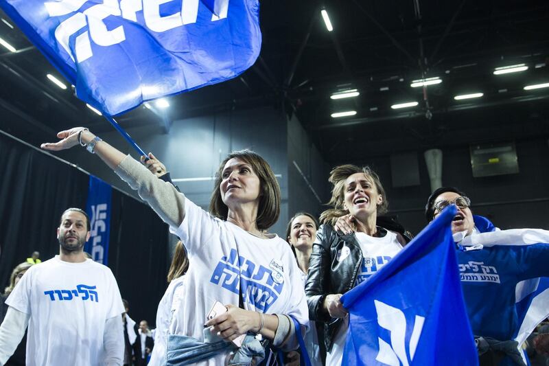 Likud party supporters cheer in Tel Aviv. Getty Images