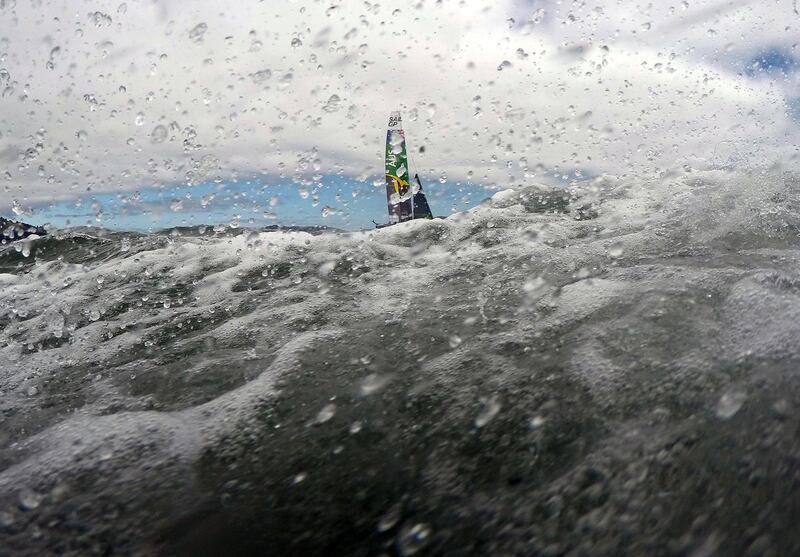 An Australian team races their F50 catamaran during California's SailGP event across San Francisco Bay, US. AFP