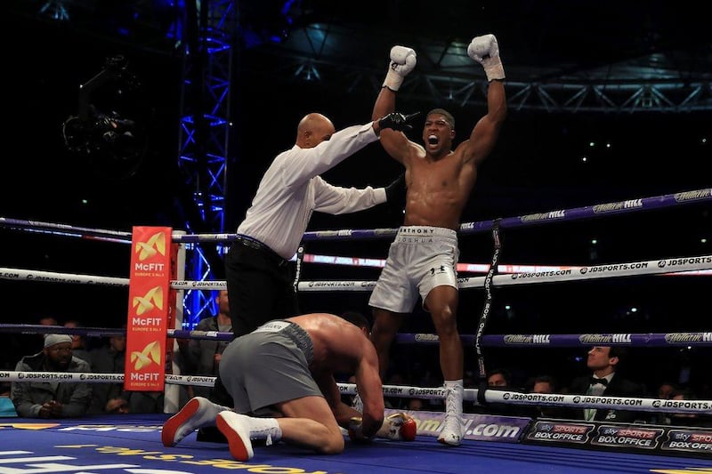 Anthony Joshua, right, puts Wladimir Klitschko down in the fifth round during the IBF, WBA and IBO Heavyweight World title bout at Wembley Stadium on April 29, 2017 in London, England. Richard Heathcote / Getty Images