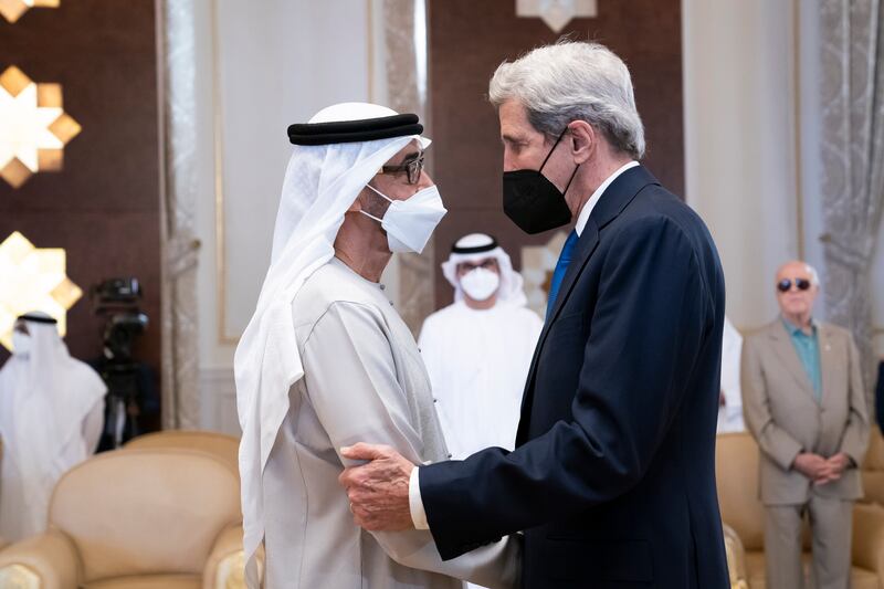Mr Kerry greets the President, Sheikh Mohamed.