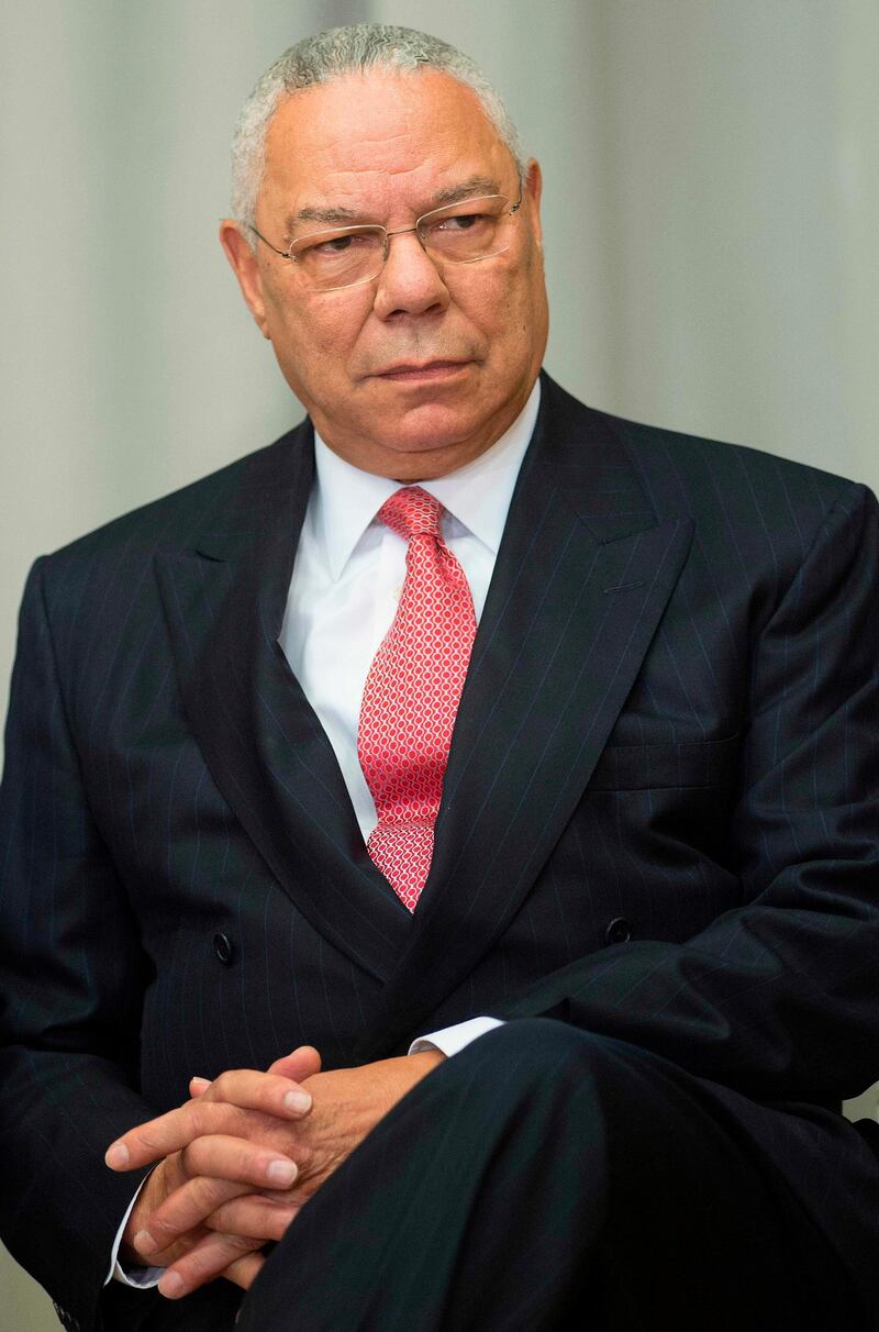 (FILES) In this file photo former US Secretary of State Colin Powell listens during a ceremony to break ground on the US Diplomacy Center at the US State Department in Washington, DC, September 3, 2014.                 Colin Powell, who served as America's top military officer and top diplomat under Republican presidents, said June 7, 2020 he will vote for Democrat Joe Biden, accusing Donald Trump of drifting from the US constitution. In a scathing indictment of Trump on CNN, Powell denounced the US president as a danger to democracy whose lies and insults have diminished America in the eyes of the world.
 / AFP / Jim WATSON
