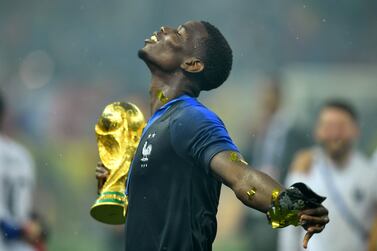 Paul Pogba holds the World Cup trophy after a tournament that saw billions waged in bets. REUTERS